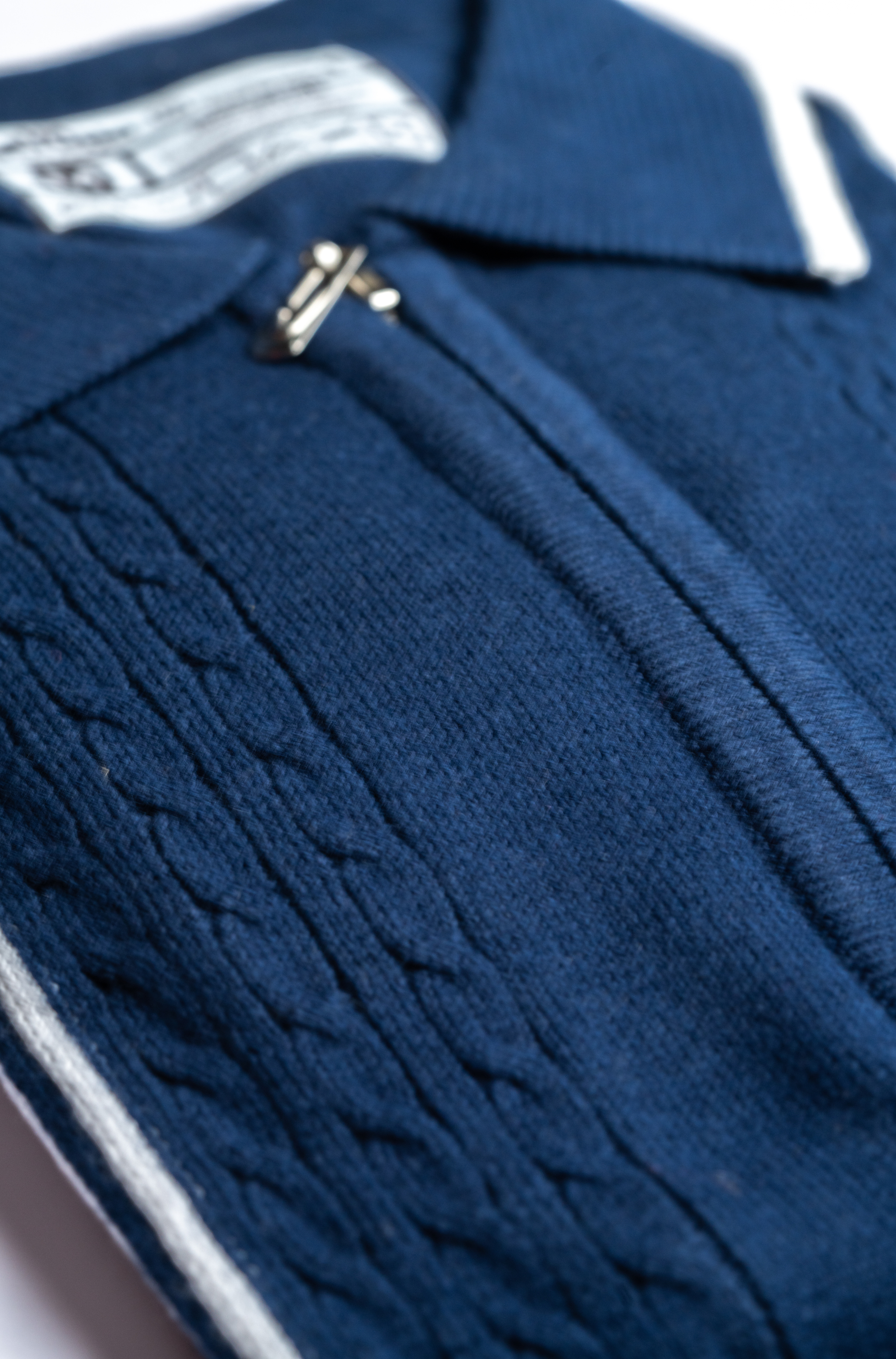 Retro-Inspired Navy Knit Polo Shirt with Contrast Panels